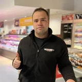 Portrait de B. Collin, gérant du SPAR d'Ivoz-Ramet, client de GOUPSS